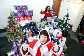 Jeanette Walsh aka Mother Christmas with some of the gifts donated to the annual appeal