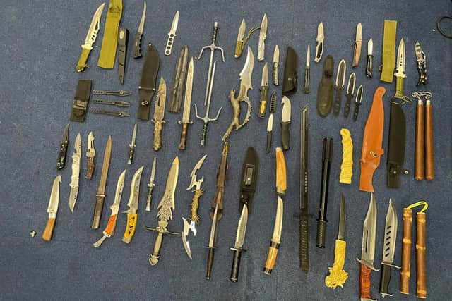 Police discovered this frightening array of weapons during a drugs raid on Wednesday