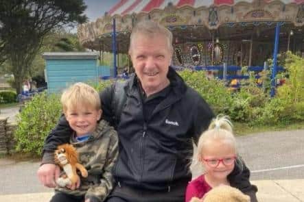 Karl Chambers with two of his grandchildren