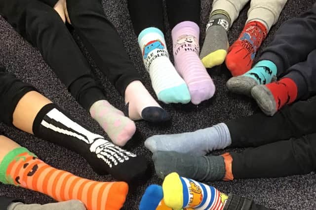Green Oaks Primary School celebrated with "Odd Socks Day" as a way to celebrate and discuss individuality