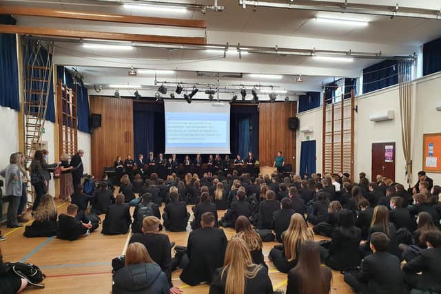 Pictured: Sponne School holds an assembly describing when mean comments can become bullying