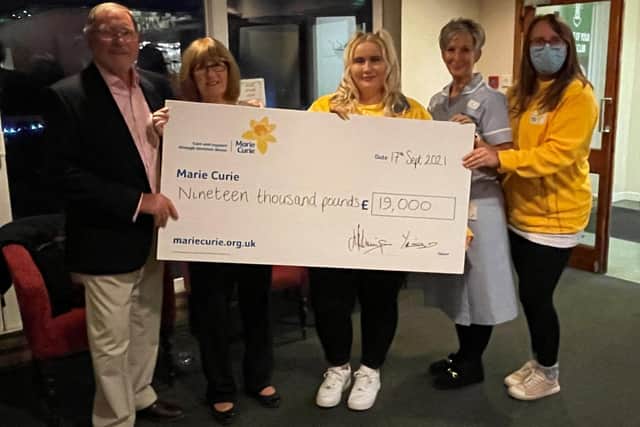 Bill Hemmings, Yvonne Hemmings, Sophie Oliver (Senior Co-Ordinator), Debbie Oliver (Marie Curie Health Care Assistant) and Maxine Andrews (Community Fundraiser) at the presentation.