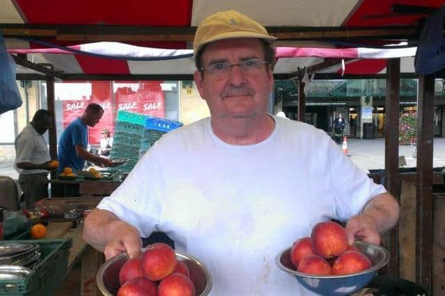 Fitzy runs a fruit and veg stall on the Market Square