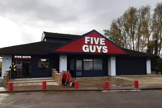 Signs have gone up for the new Five Guys in Sixfields.