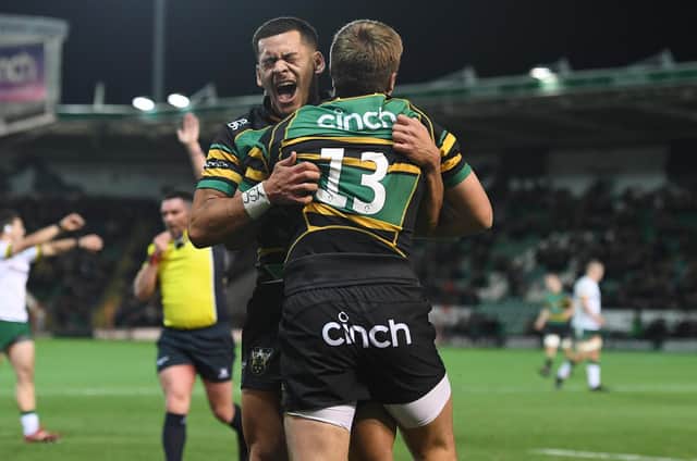Connor Tupai celebrated with Tom Litchfield after the centre secured Saints a try bonus point against London Irish last weekend