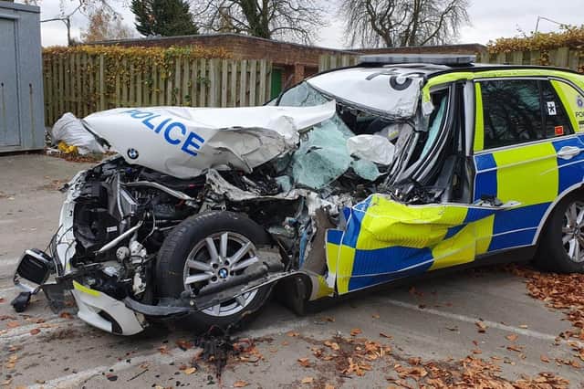 Two police officers were amazingly just 'battered and bruised' after their BMW crashed on the A45.