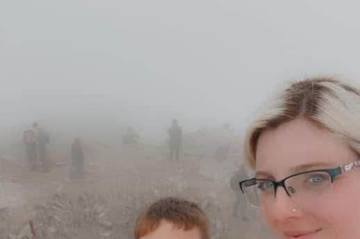 Kayleigh and Oliver at the peak of Mount Snowdon