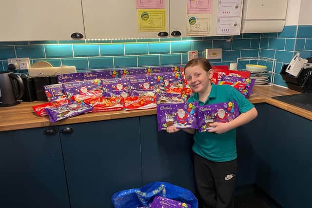 The young lad has already collected over 100 boxes with more yet to come