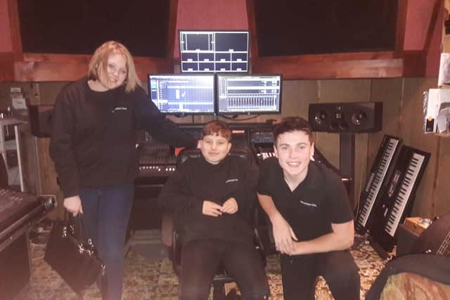 Students recorded the song in a professional studio.
