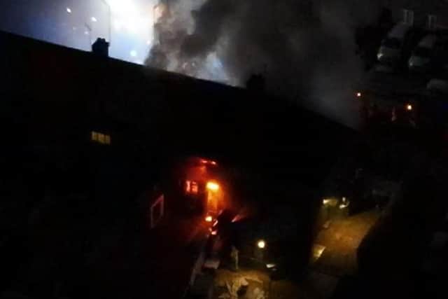 Drone footage showed flames and black smoke billowing from the house in Birchfield Road