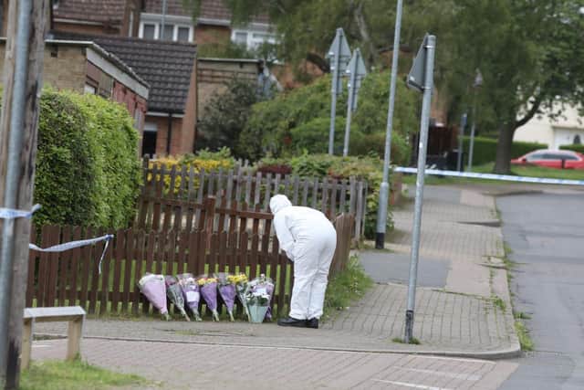 Flowers laid at the scene the morning after Rayon's death