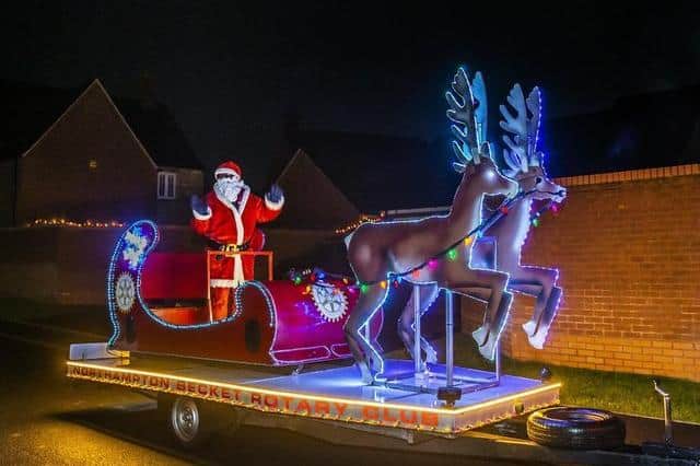 Santa will wave to and say hello to children on his route around the town.