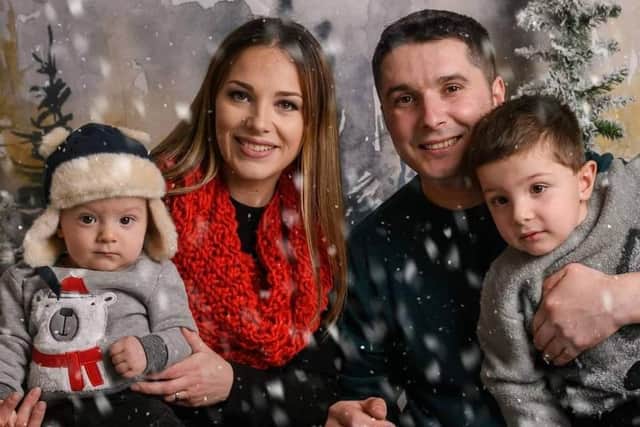 Alina and Dragos with their two young boys