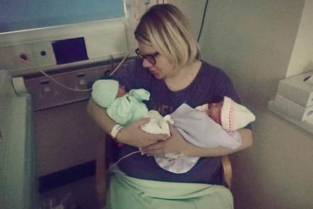 Abbie with her twin girls.