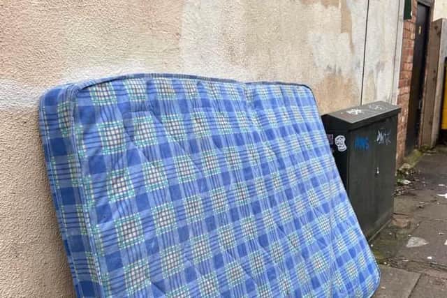 A fly-tipped mattress left out on the pavement just off Kettering Road