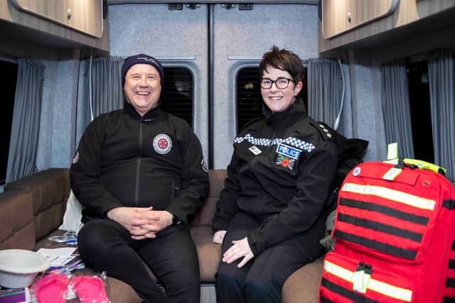 Commissioner Stephen Mold (Left) sits with Chief Inspector Rachael Handsford inside the SNO van