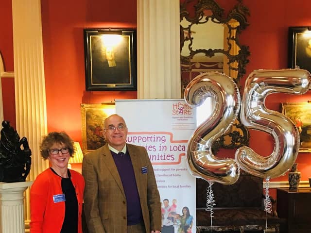 Celebrating the 25th birthday are Jean Morgan (Chair) with Matt Foreman (Scheme Manager).