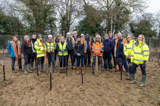 Daventry Mayor Karen Tweedale helps plant the new trees.