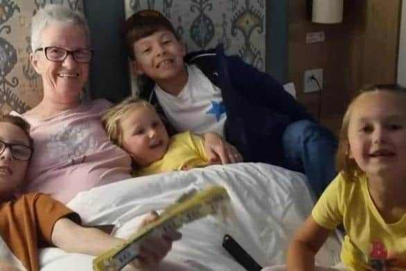 Sally Spencer with her grandchildren