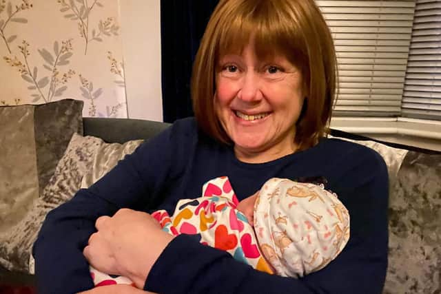Proud Elaine with her new granddaughter Lila Elaine.