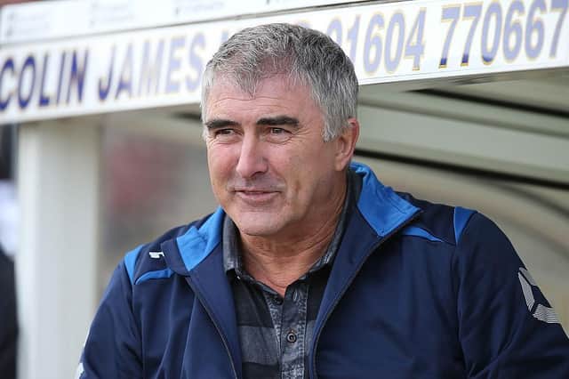 Former Cobblers boss Ian Atkins has accepted an invitation to join the board of the Supporters Trust