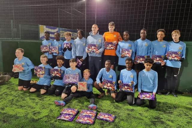 The Harlestone Youth Football Club donated Christmas selection boxes to Northampton General Hospital.