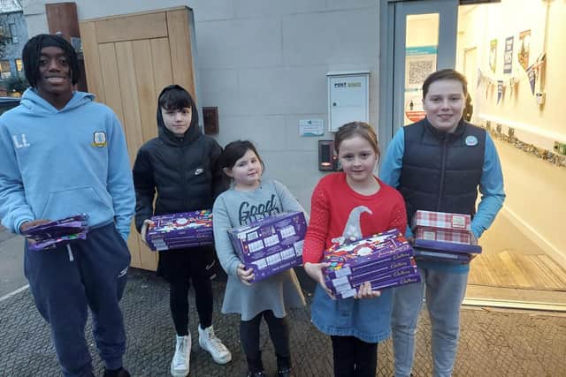 Three boys from the youth football club, along with two mascots, dropped off the donations to NGH on Tuesday (December 21).