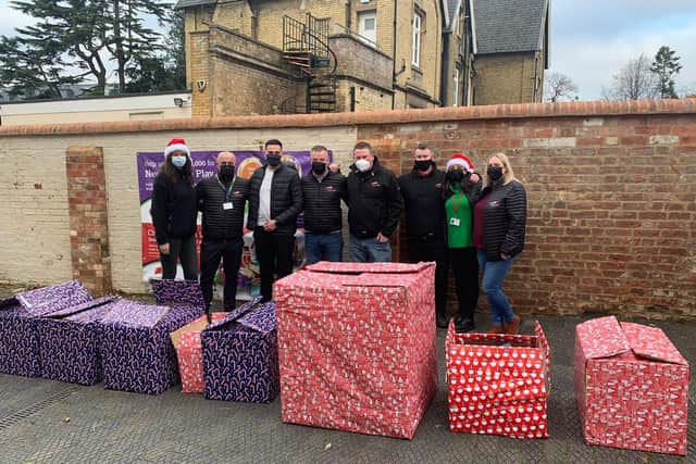 Staff from Panther Logistics with their donated presents.