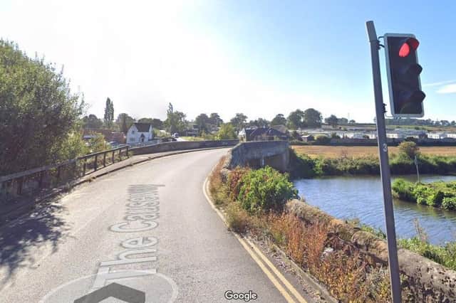 The Causeway has been closed after a vehicle struck the bridge over the Nene