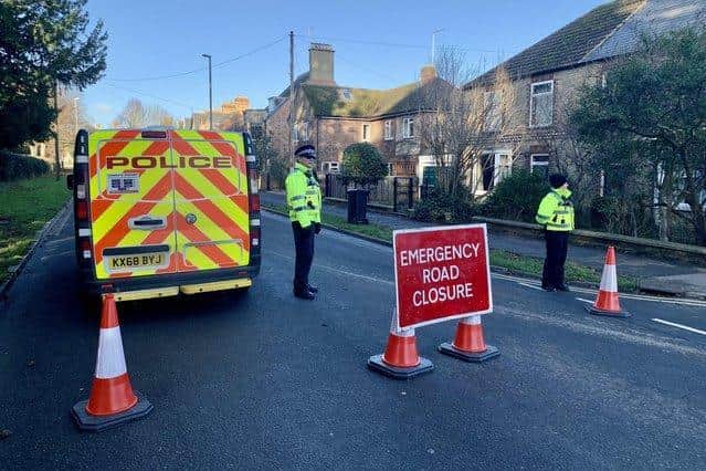 Police on the scene in Glapthorn Road, Oundle earlier today