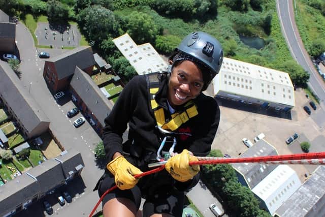 Lorraine Lewis abseiling last year.