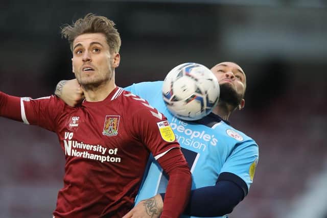 Danny Rose battles for the ball in the Cobblers' clash with Crawley Town (Picture: Pete Norton)