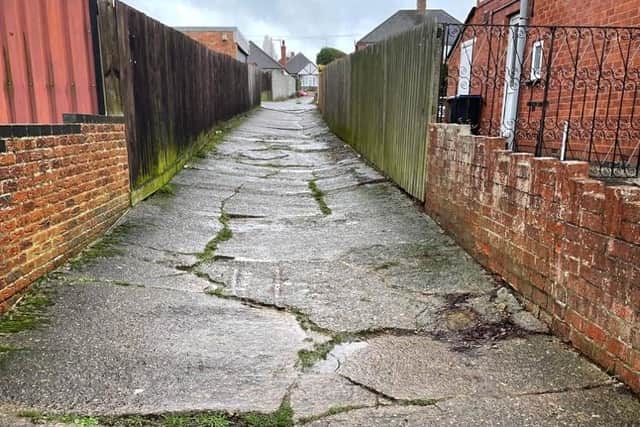 The alleyway in Friar's Crescent, Far Cotton is unadopted and unmaintained