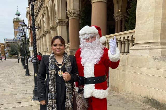 Mayor, Rufia Ashraf, with Santa