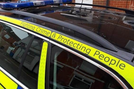Police are appealing for witnesses after a woman was robbed in an underpass on Monday night
