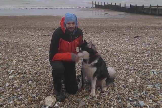 Martyn, 38, with his dog, Rocket.