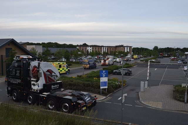 The convoy organised by Jason, his brother Nathan and fellow lorry driver Danny Whitmore arrives at Peterborough City Hospital in May 2020  in time for the 8pm clap for the NHS. Pictues: David Lowndes