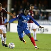 Idris Kanu tussles with Sam Foley while playing for Peterborough against the Cobblers in an EFL Trophy clash in October, 2017