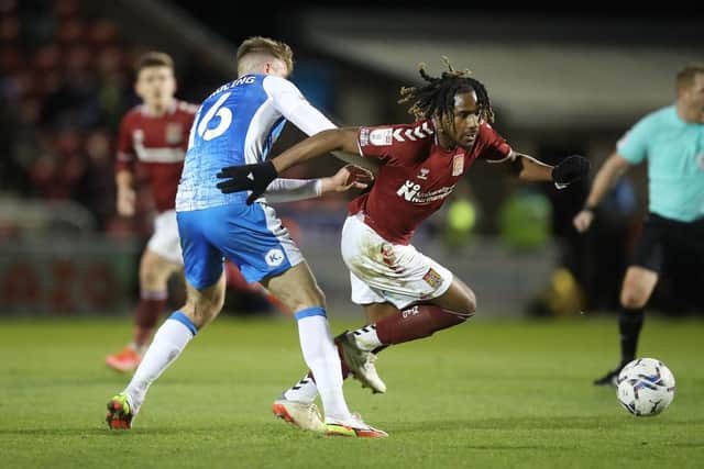Josh Eppieh on the ball for the Cobblers in their 1-0 defeat to Barrow on Tuesday (Picture: Pete Norton)