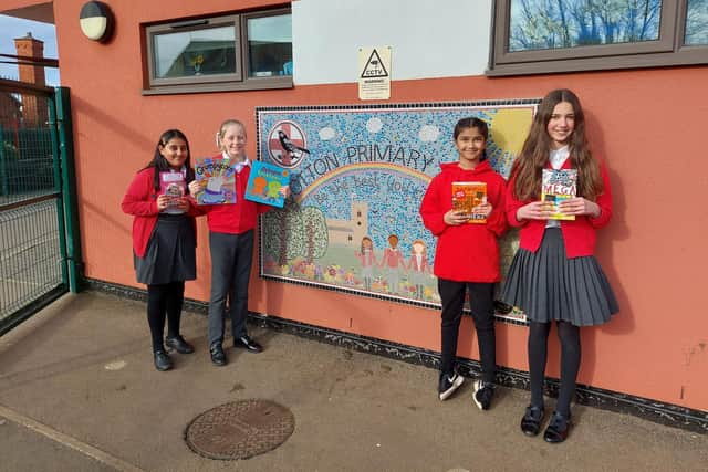The book donation is part of Wootton Primary School's '150 good deeds' to mark the school's milestone anniversary.