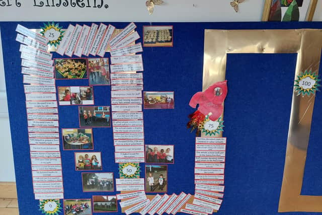Wootton Primary School's '150 good deeds' display, which shows they are already halfway to their goal.