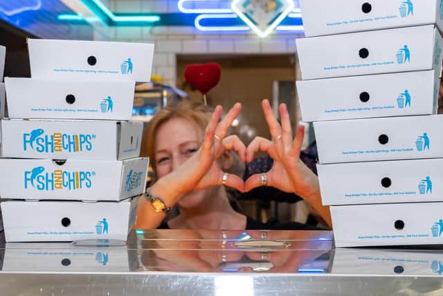 Charlotte White with the food that was donated to homeless people.