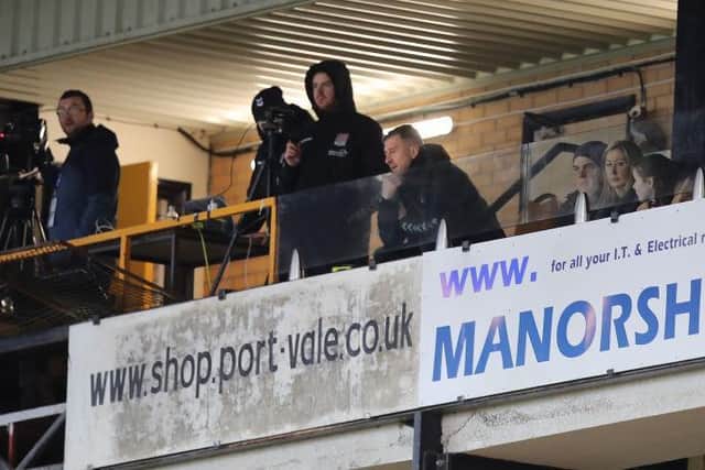 Jon Brady watched Saturday's game from the gantry.