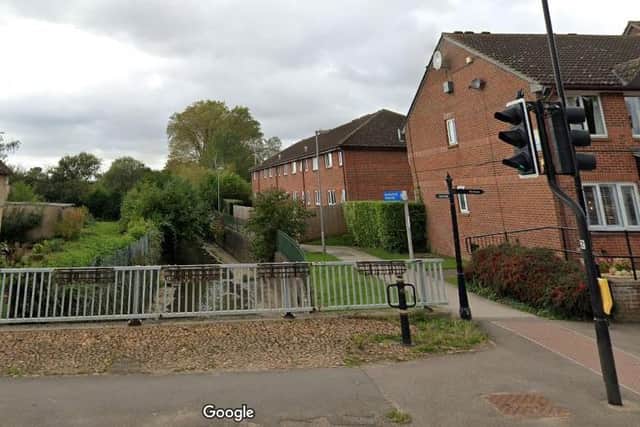 Police are hunting three boys who attacked a woman on this Towcester footpath in the early hours of Sunday morning.