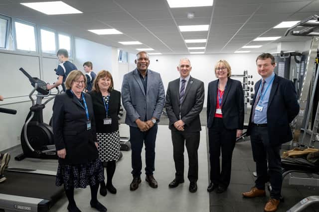Devon Malcolm with staff from Guilsborough Academy.
