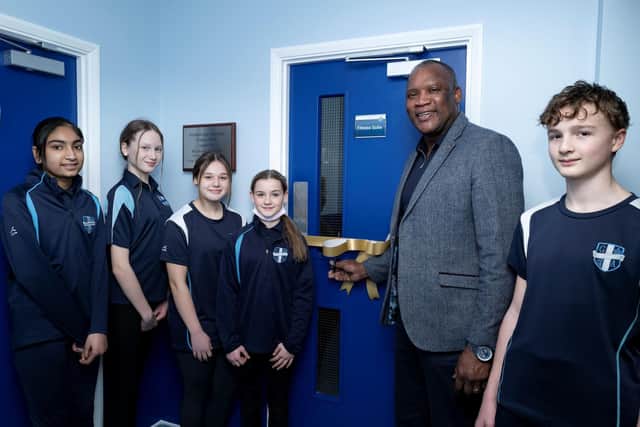 Devon Malcolm with students from Guilsborough Academy.
