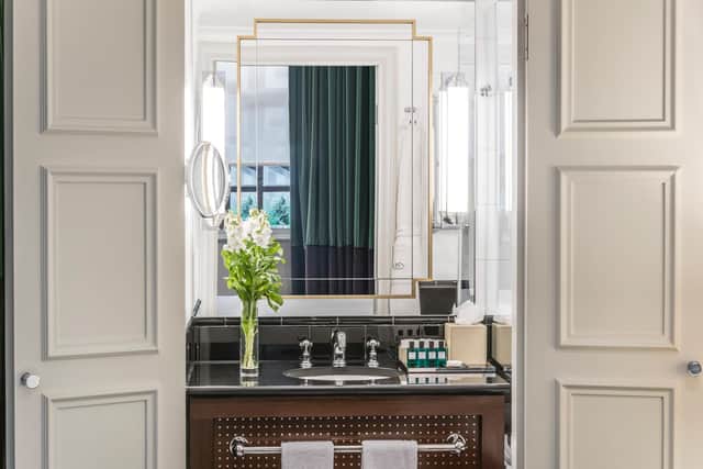 The doors to the bathroom in a Superior room