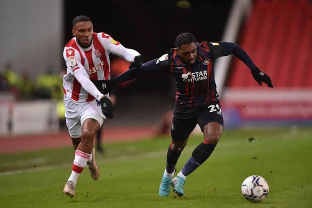Amari'i Bell gets away from his marker during Town's win at Stoke last night