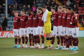 Cobblers players line-up before kick-off. Pictures: Pete Norton.