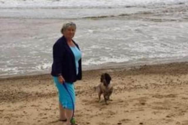 Linda pictured in 2018 with her dog, Tilly.